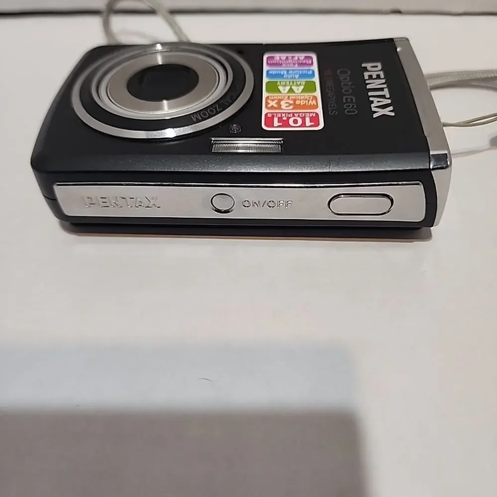 Pentax Optio E60 10.1 MP Digital Point And Shoot Camera W/ AV/USB Cable Tested